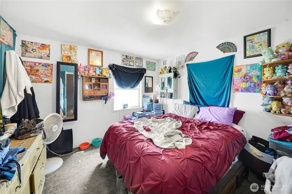 a bedroom with a bed and a large closet