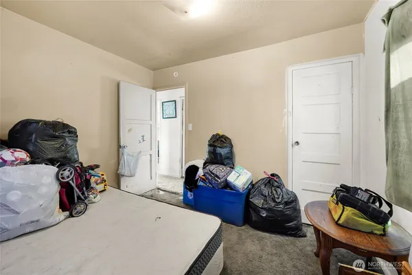 a room with furniture and wooden floor