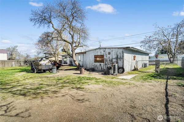 a house view with a backyard space