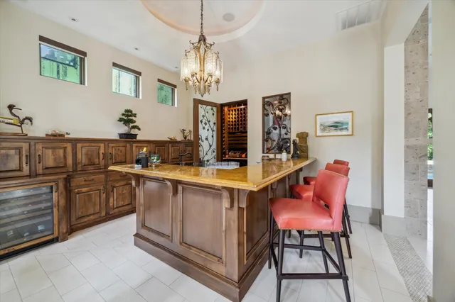 a living room with fireplace furniture and a flat screen tv