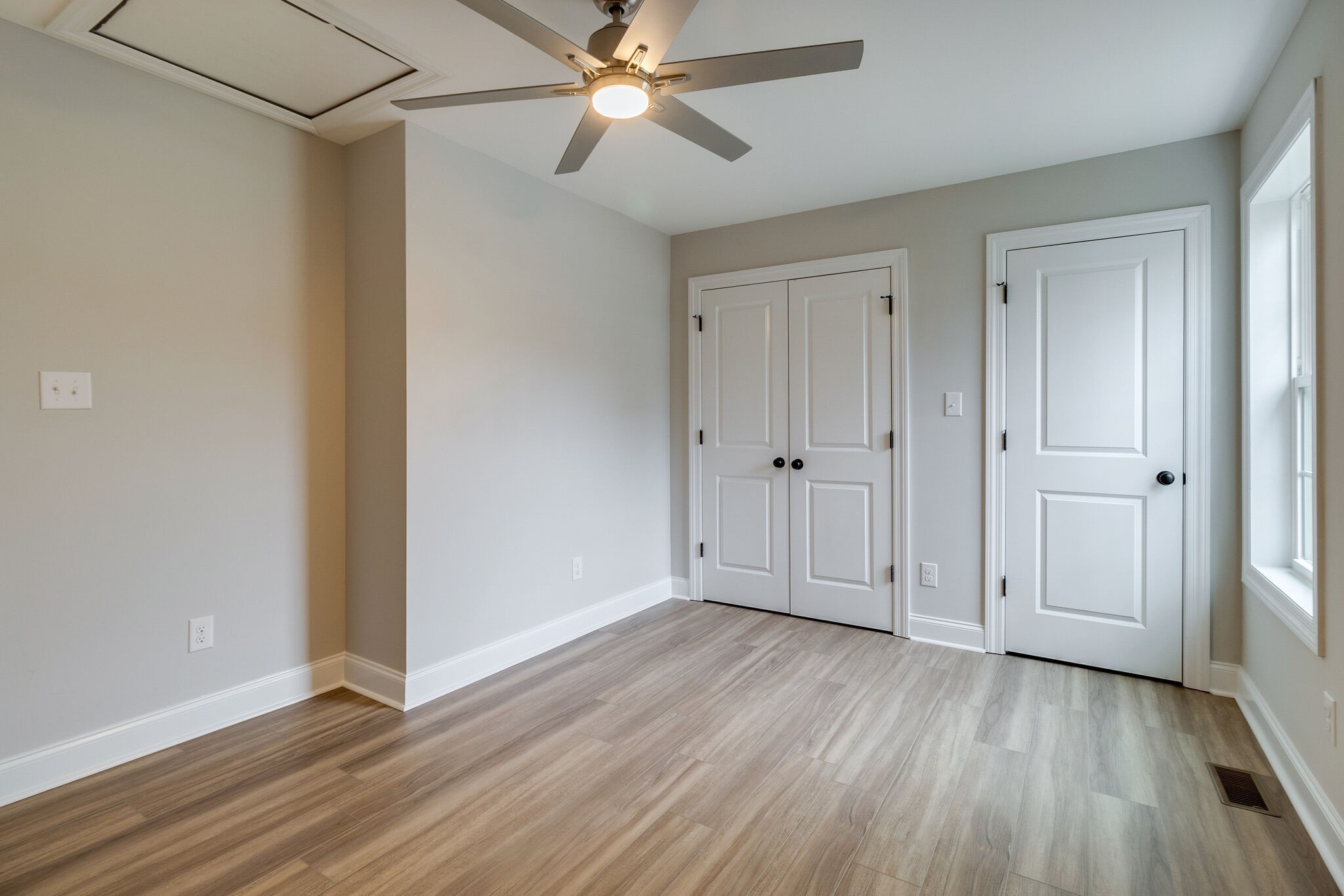 1008 Beckett Street, Unit A Columbia, TN 38401 - Photo 23 of 29 a view of an empty room with wooden floor