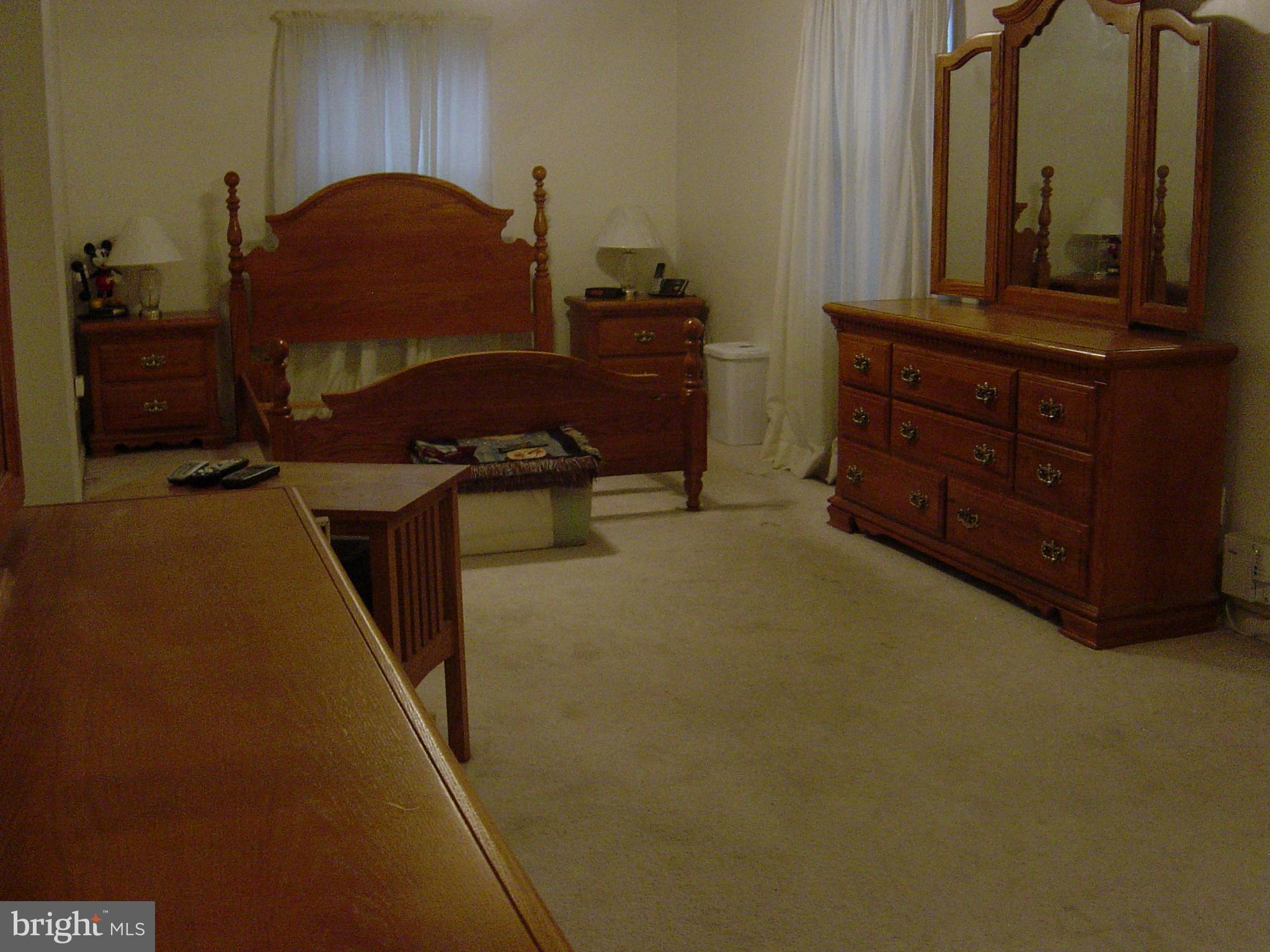 10 Ridgemoor Road Baltimore, MD 21221 - Photo 9 of 18 Spacious 1st fl bedroom with his and her closets