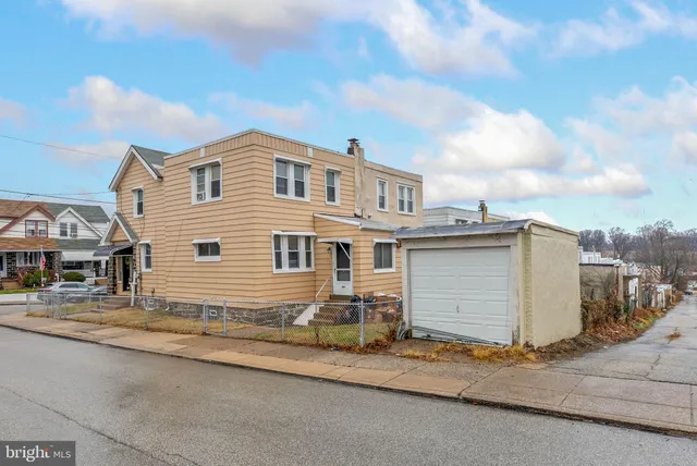a house view with a street
