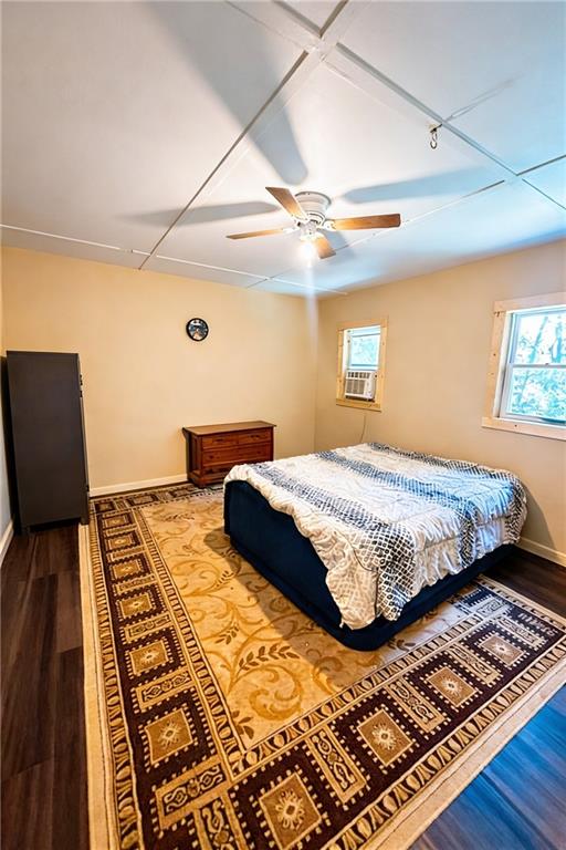 180 Alonzo Cain Road Dahlonega, GA 30533 - Photo 17 of 28 a bedroom with a bed and wooden floor