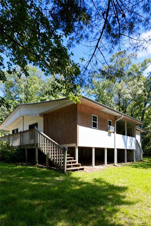 180 Alonzo Cain Road Dahlonega, GA 30533 - Photo 8 of 28 a front view of a house with a yard