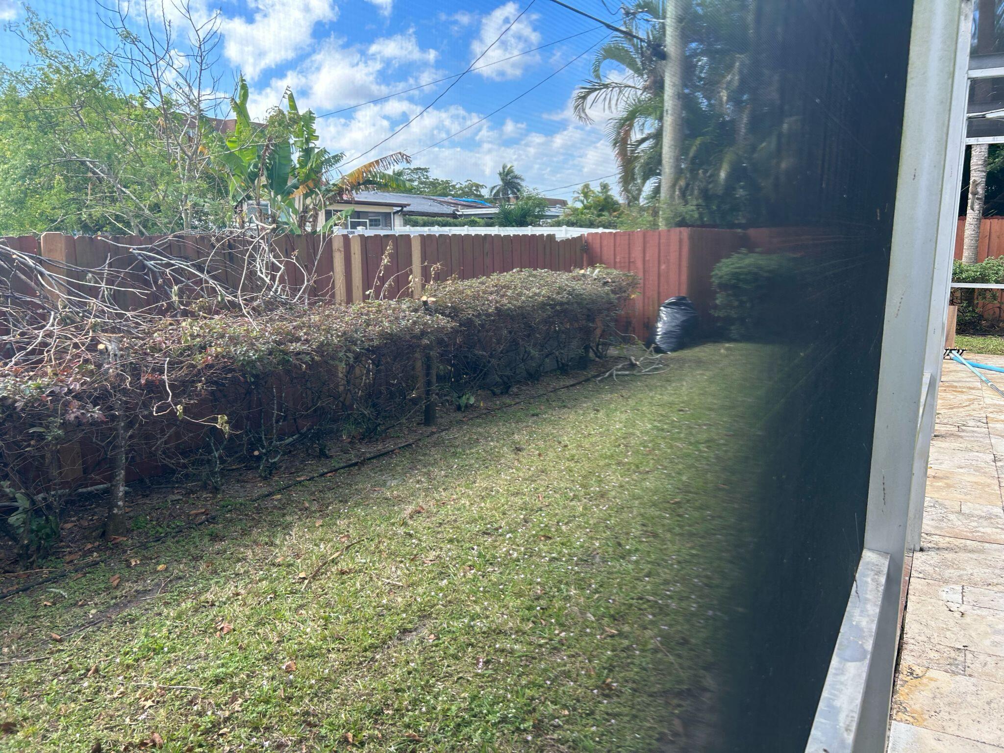 5200 Adams Street Hollywood, FL 33021 - Photo 21 of 24 a view of backyard with green space