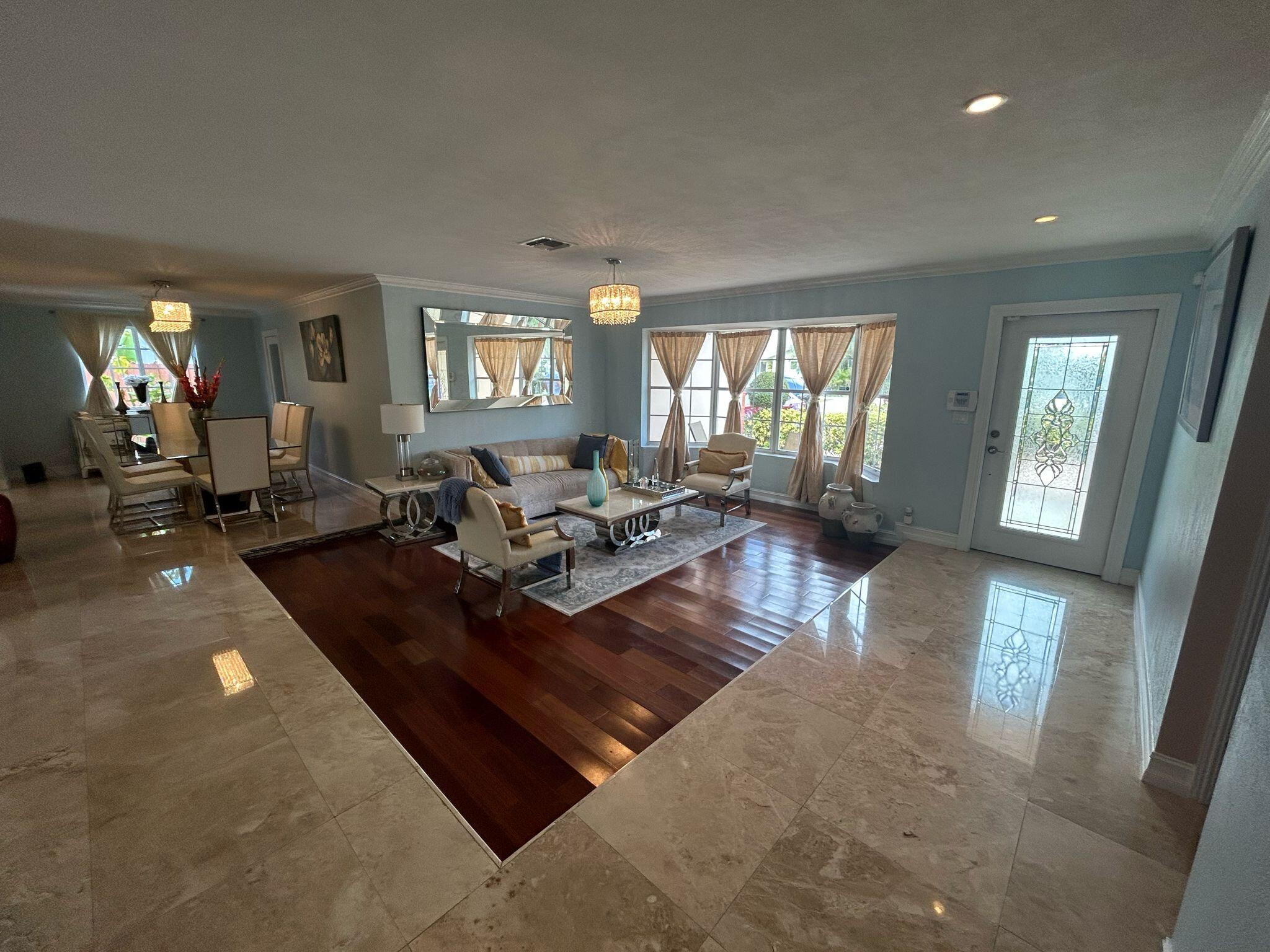 5200 Adams Street Hollywood, FL 33021 - Photo 3 of 24 a living room with furniture and a fireplace