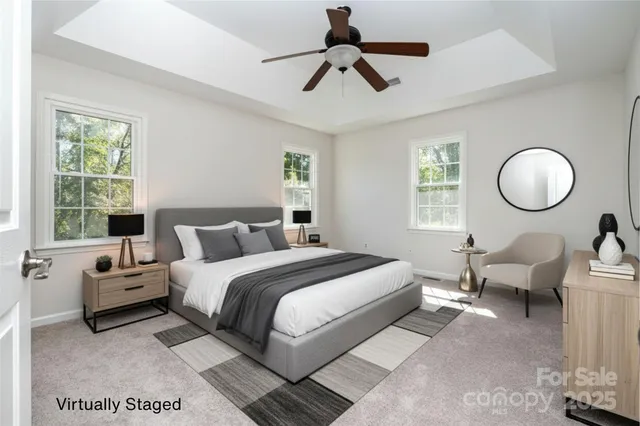 a bed room with bed and window