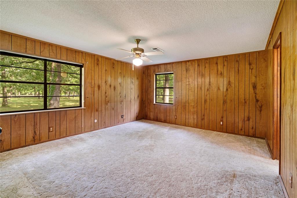 64 Farm Road 2121 Paris, TX 75462 - Photo 12 of 34 Bedroom with ensuite bath