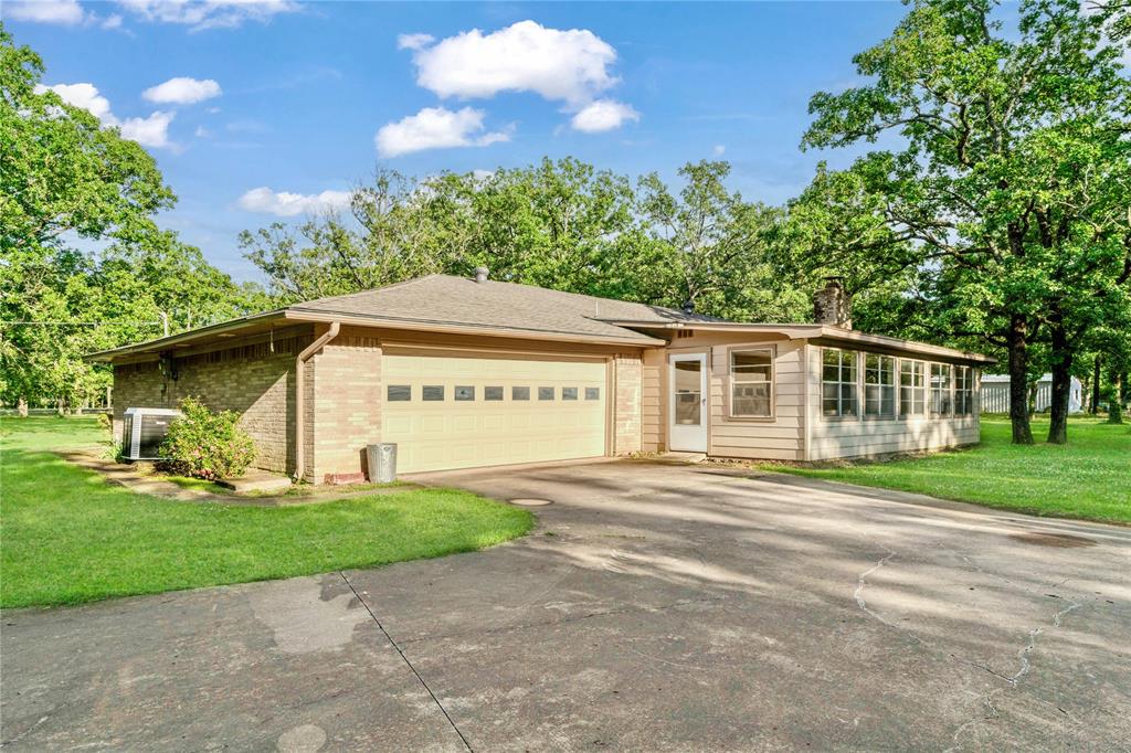64 Farm Road 2121 Paris, TX 75462 - Photo 18 of 34 Back/Garage of main residence