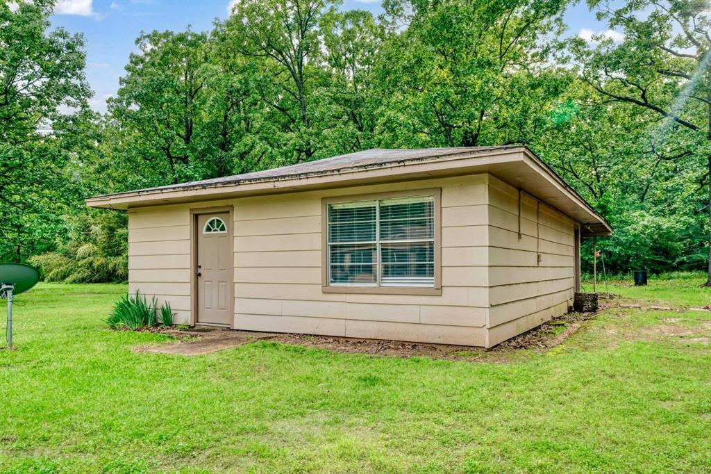 64 Farm Road 2121 Paris, TX 75462 - Photo 21 of 34 Exterior of guest house