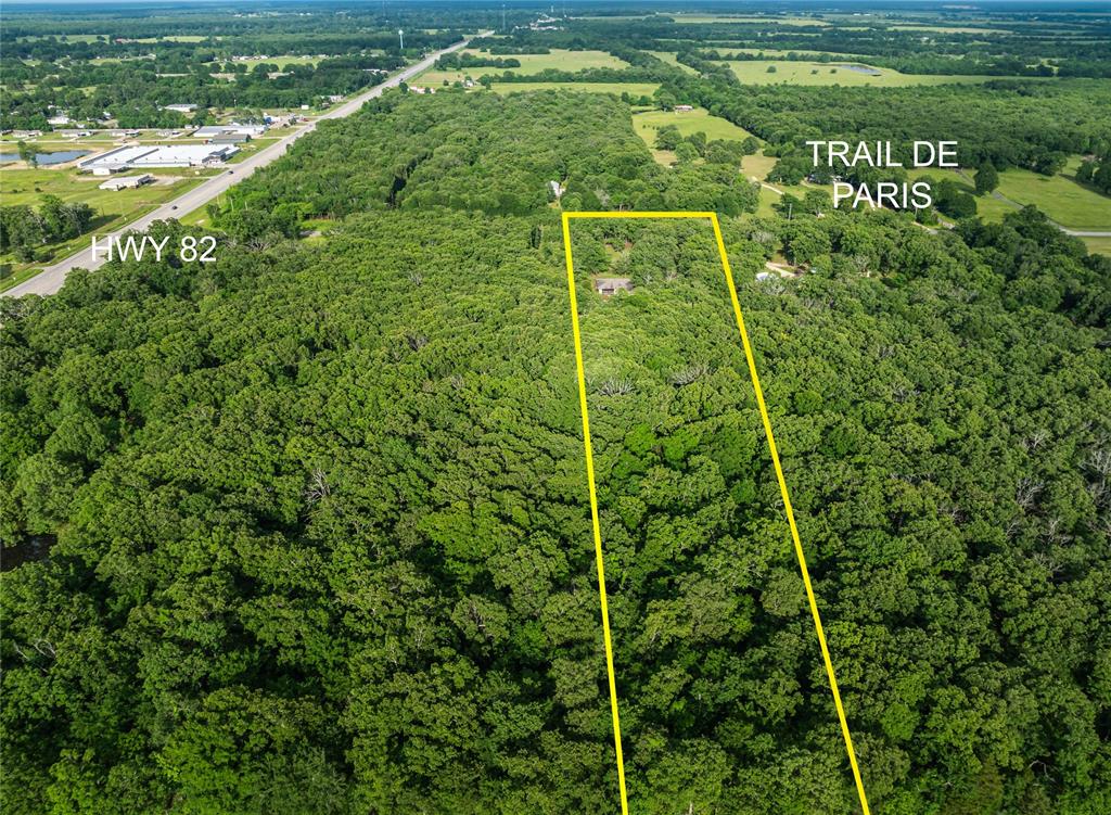 64 Farm Road 2121 Paris, TX 75462 - Photo 33 of 34 Aerial view of property's location featuring a heavily wooded area and property boundaries highlighted
