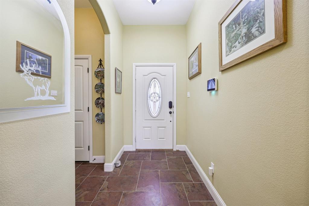 118 Kenya Court Springtown, TX 76082 - Photo 21 of 35 a view of a hallway with entryway