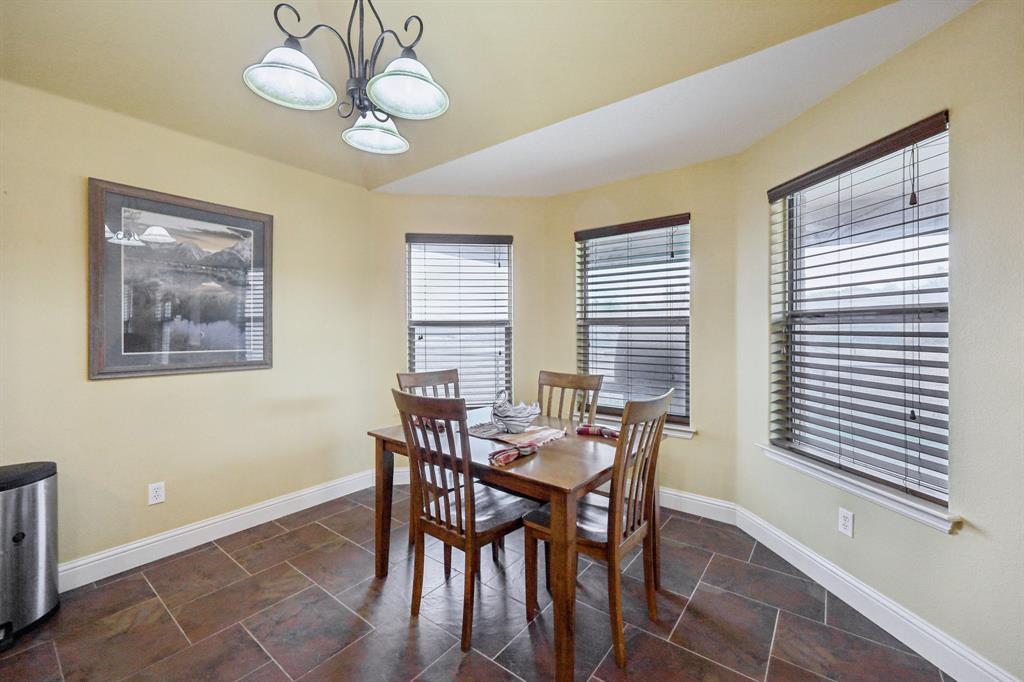 118 Kenya Court Springtown, TX 76082 - Photo 9 of 35 a view of a dining room with furniture and window