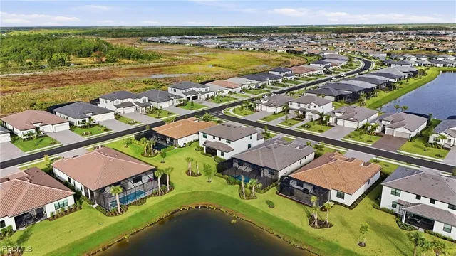 an aerial view of a city with lawn chairs