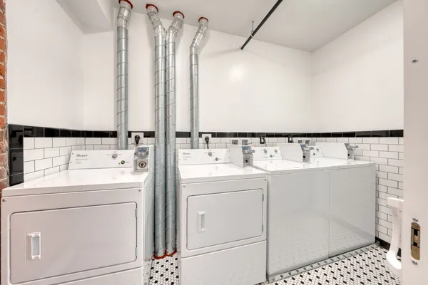 a utility room with a washer and dryer