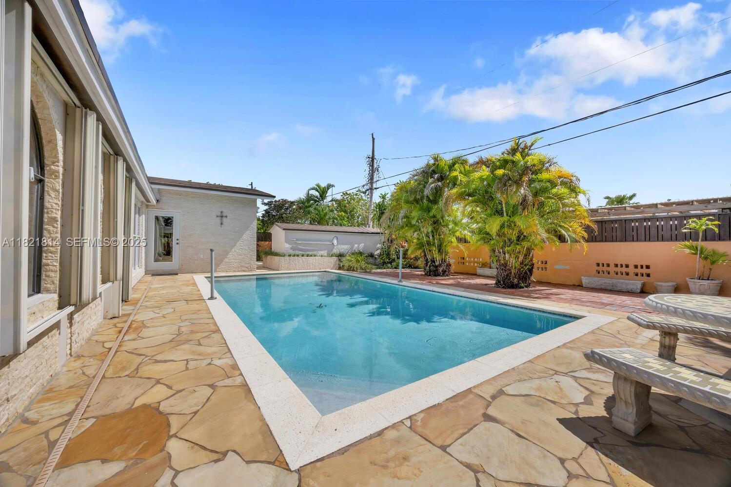 5025 Southwest 90th Court Miami, FL 33165 - Photo 15 of 18 a view of a backyard