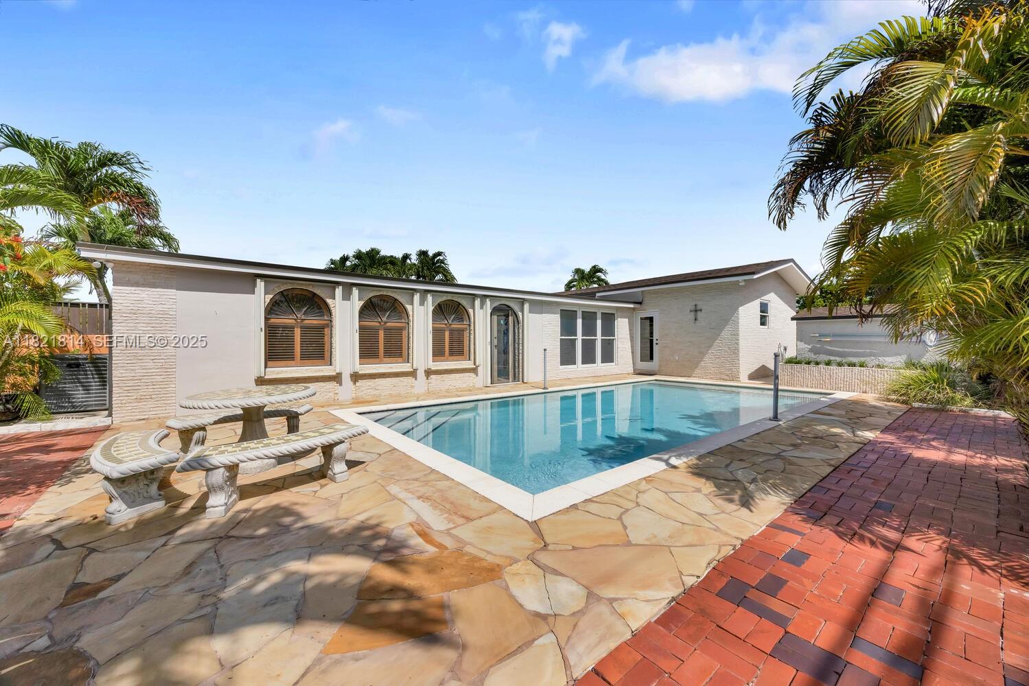 5025 Southwest 90th Court Miami, FL 33165 - Photo 16 of 18 a front view of a house with a yard
