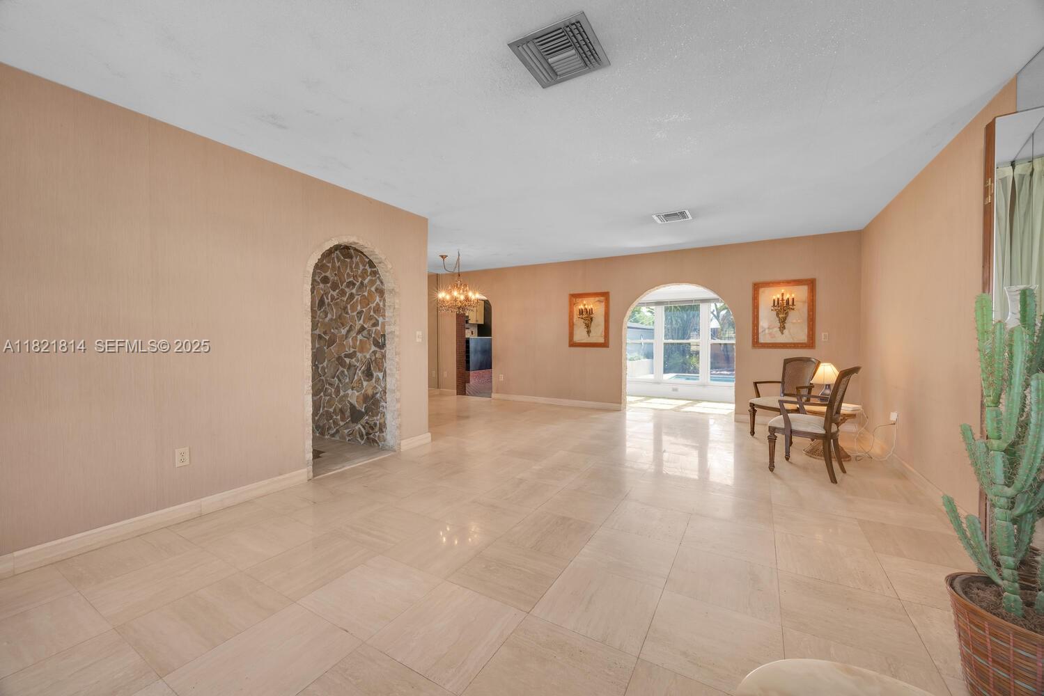 5025 Southwest 90th Court Miami, FL 33165 - Photo 4 of 18 a view of livingroom with furniture and floor to ceiling window