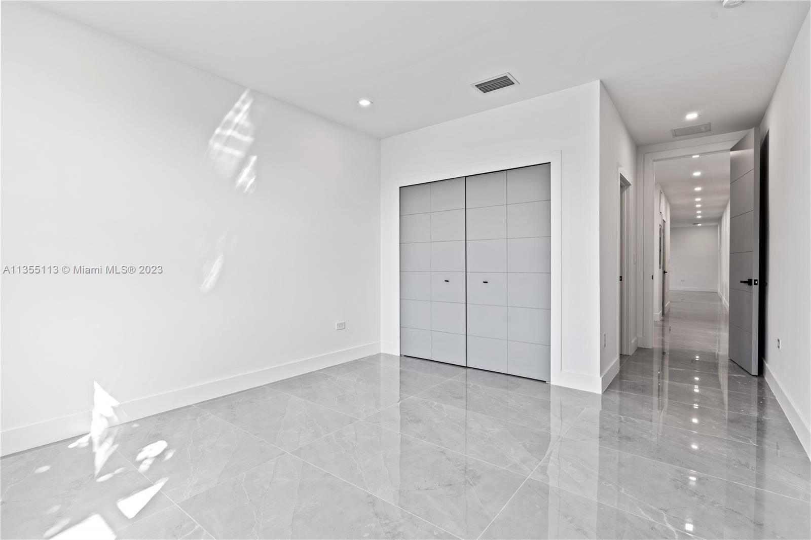 3617 Southwest 27th Street Miami, FL 33133 - Photo 20 of 29 an empty room with a bathroom