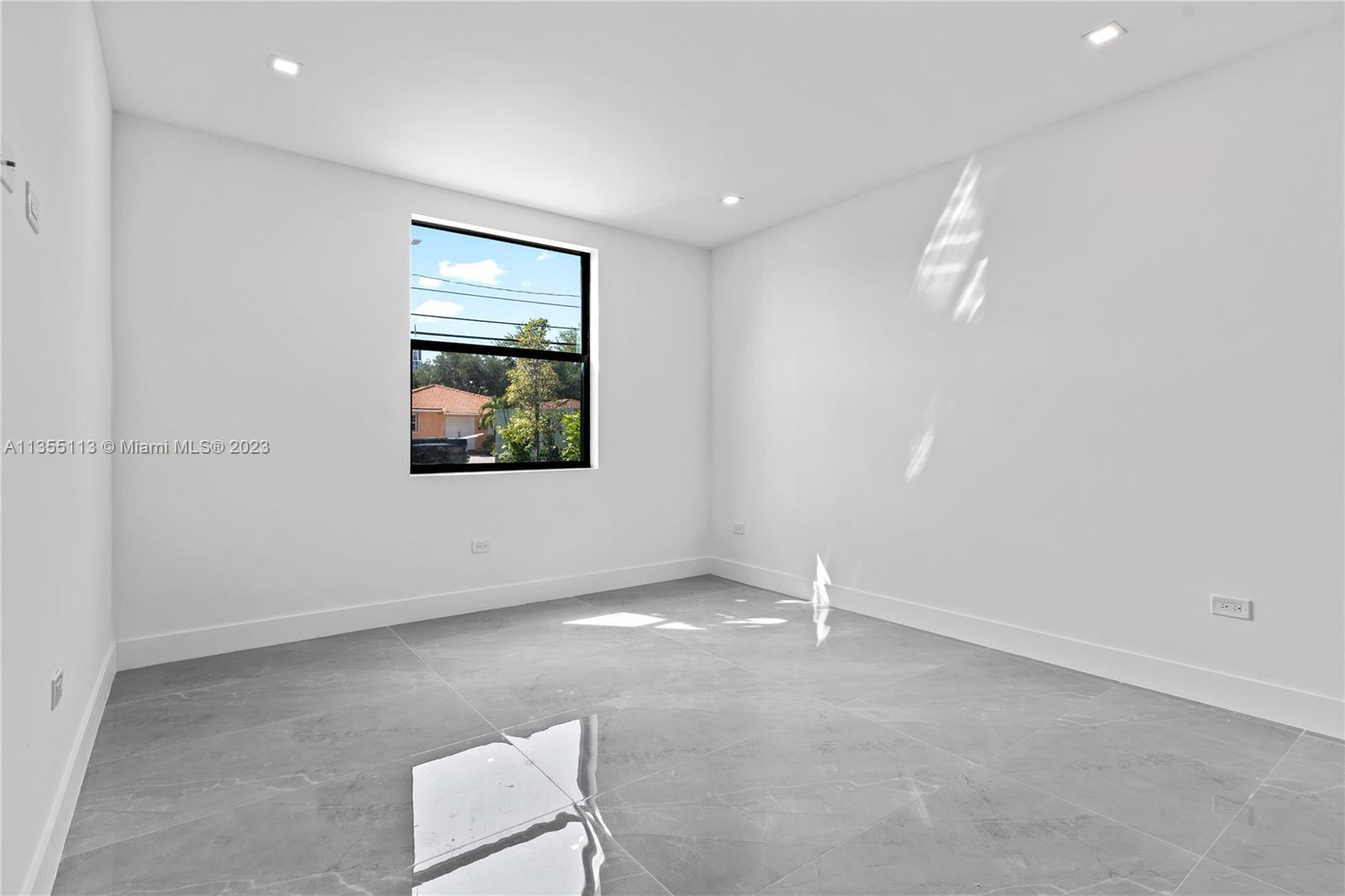 3617 Southwest 27th Street Miami, FL 33133 - Photo 21 of 29 an empty room with windows