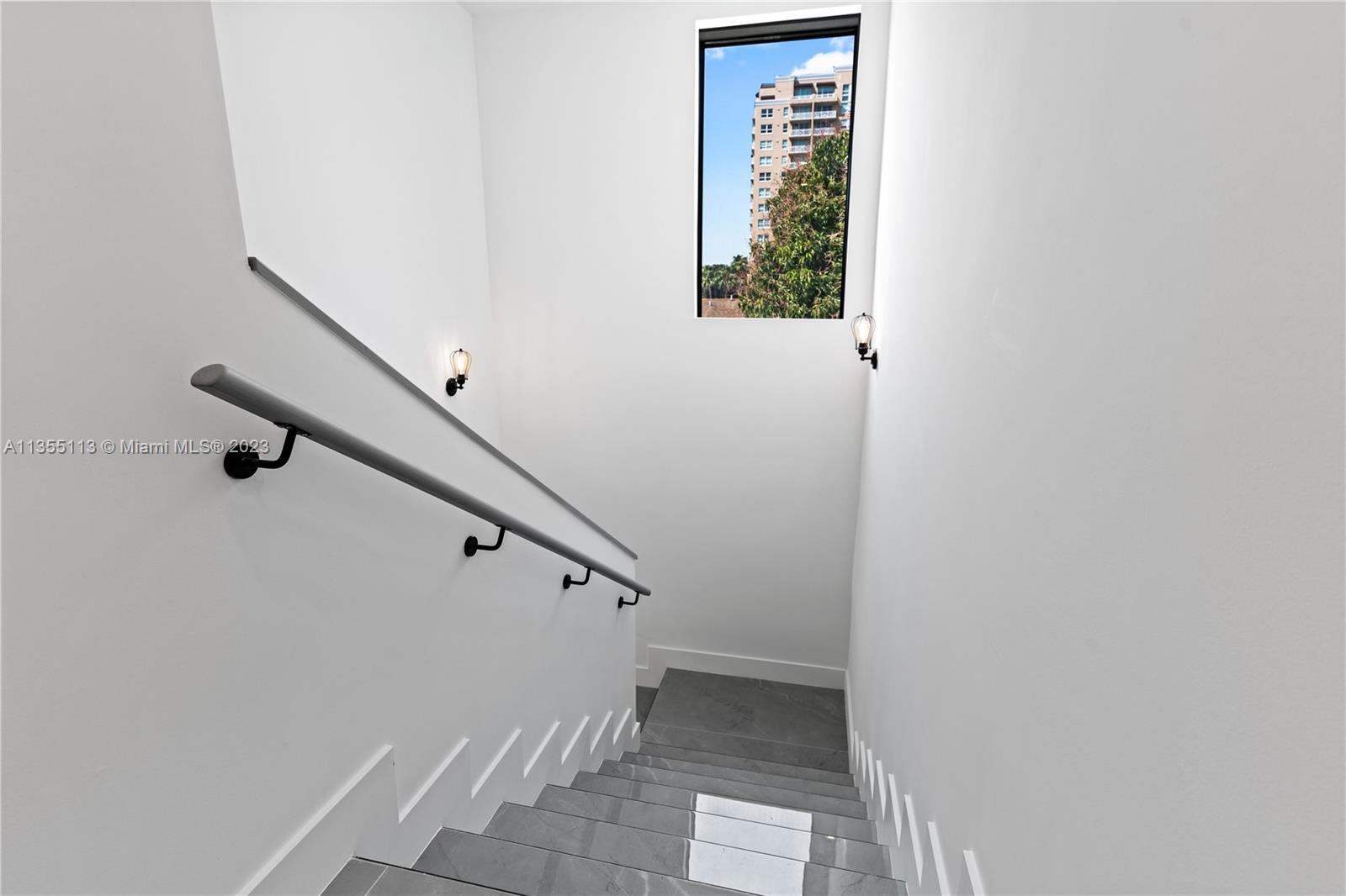 3617 Southwest 27th Street Miami, FL 33133 - Photo 8 of 29 a view of entryway with stairs
