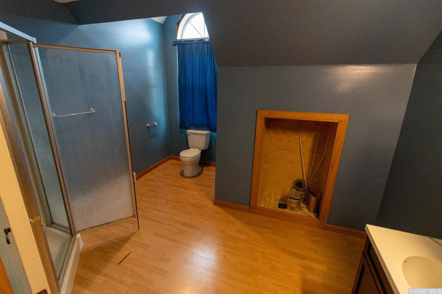 57 Waldorf Ridge Road Copake, NY 12516 - Photo 15 of 22 a bedroom with a bed and a mirror