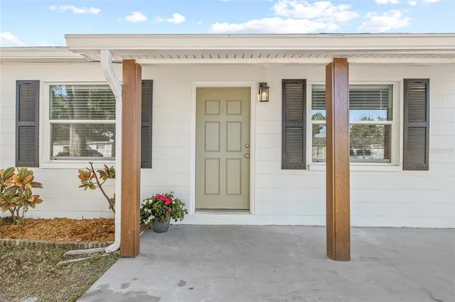 a view of a entryway door of the house