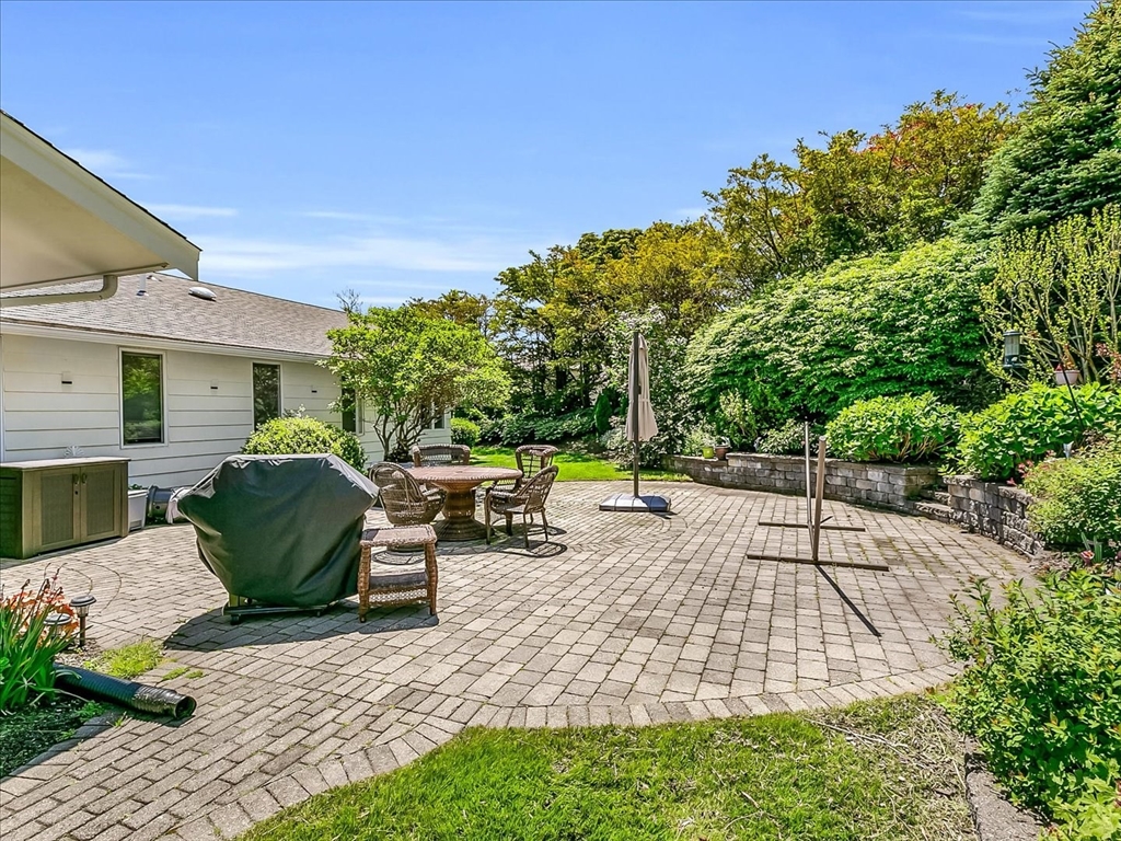 282 Atlantic Avenue Swampscott, MA 01907 - Photo 13 of 28 a view of a backyard with a patio