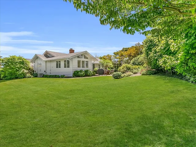 a view of a house with a big yard