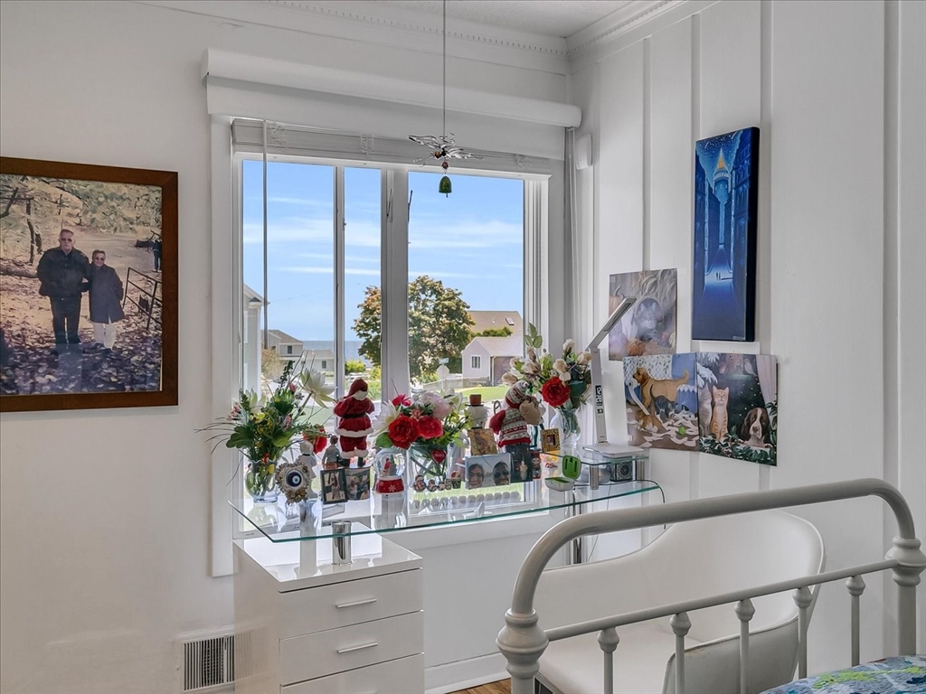 282 Atlantic Avenue Swampscott, MA 01907 - Photo 21 of 28 a view of a dining room with furniture window and flowerpot