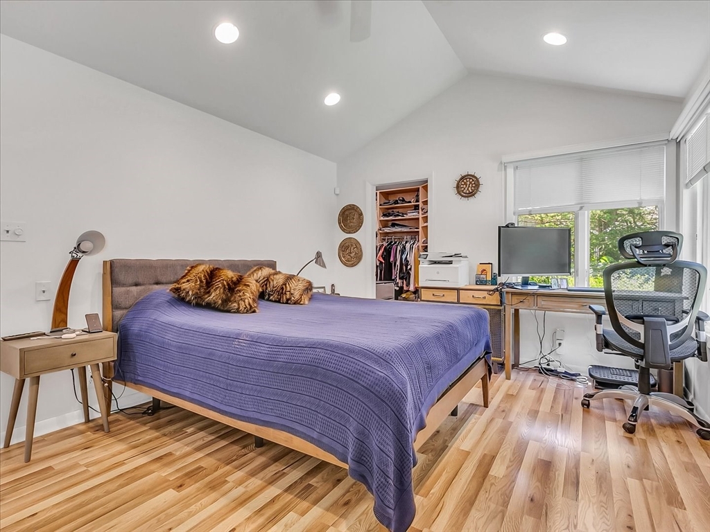 282 Atlantic Avenue Swampscott, MA 01907 - Photo 24 of 28 a bed room with a bed and a desk