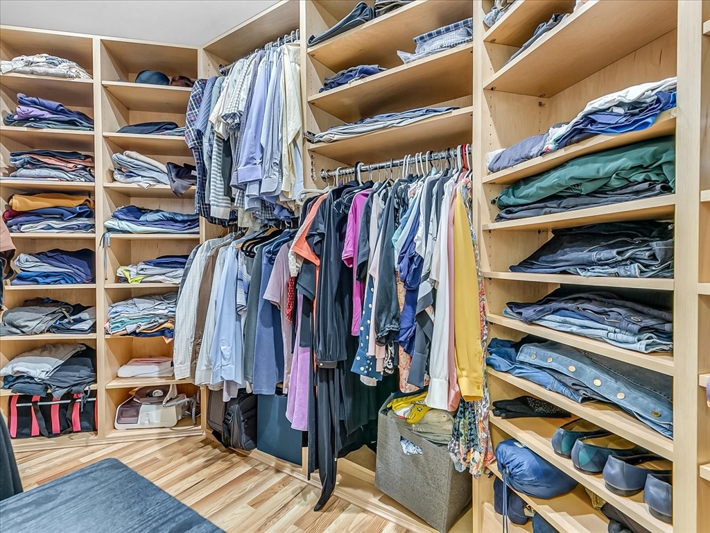 282 Atlantic Avenue Swampscott, MA 01907 - Photo 25 of 28 a view of walk in closet with clothes and shoes