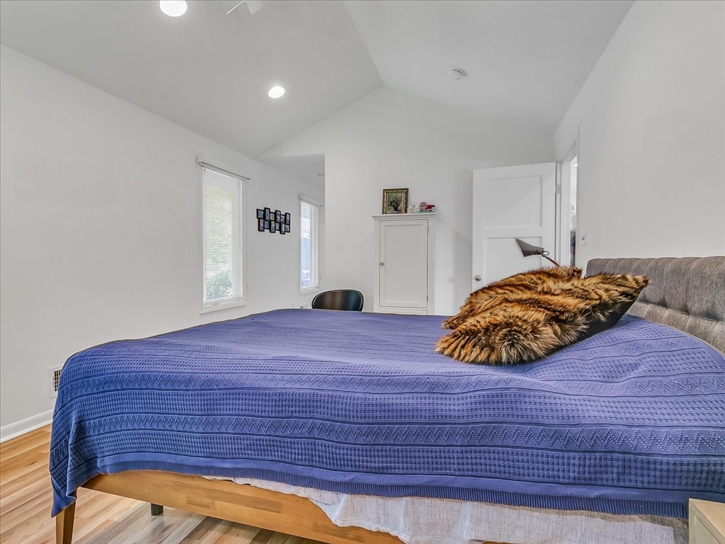282 Atlantic Avenue Swampscott, MA 01907 - Photo 26 of 28 a bedroom with a bed and a window