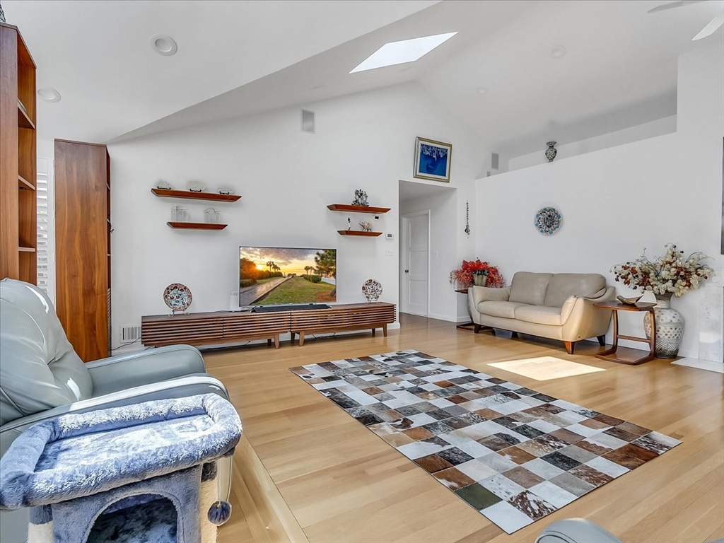 282 Atlantic Avenue Swampscott, MA 01907 - Photo 4 of 28 a living room with furniture and a rug