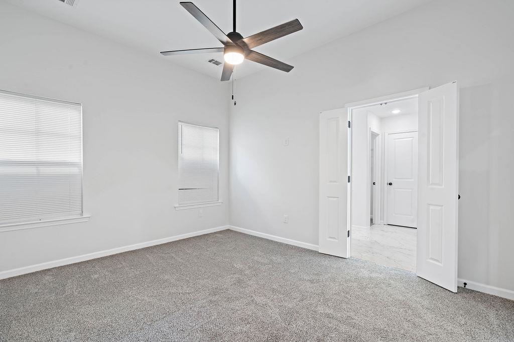 351 Edith Avenue Memphis, TN 38126 - Photo 11 of 15 Unfurnished bedroom featuring light colored carpet and a ceiling fan