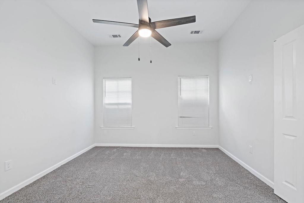 351 Edith Avenue Memphis, TN 38126 - Photo 12 of 15 Unfurnished room with carpet floors and ceiling fan