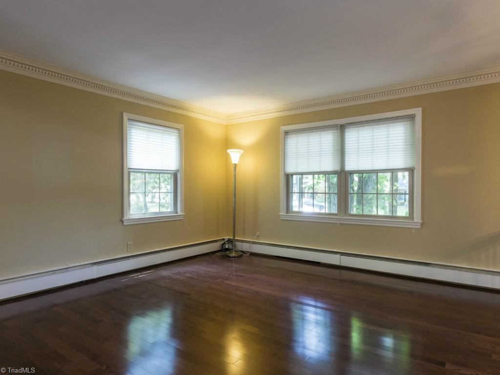 3612 Pinetop Road Greensboro, NC 27410 - Photo 2 of 30 Hardwoods in the Living Room that is located to your right just as you walk up the entry steps!
