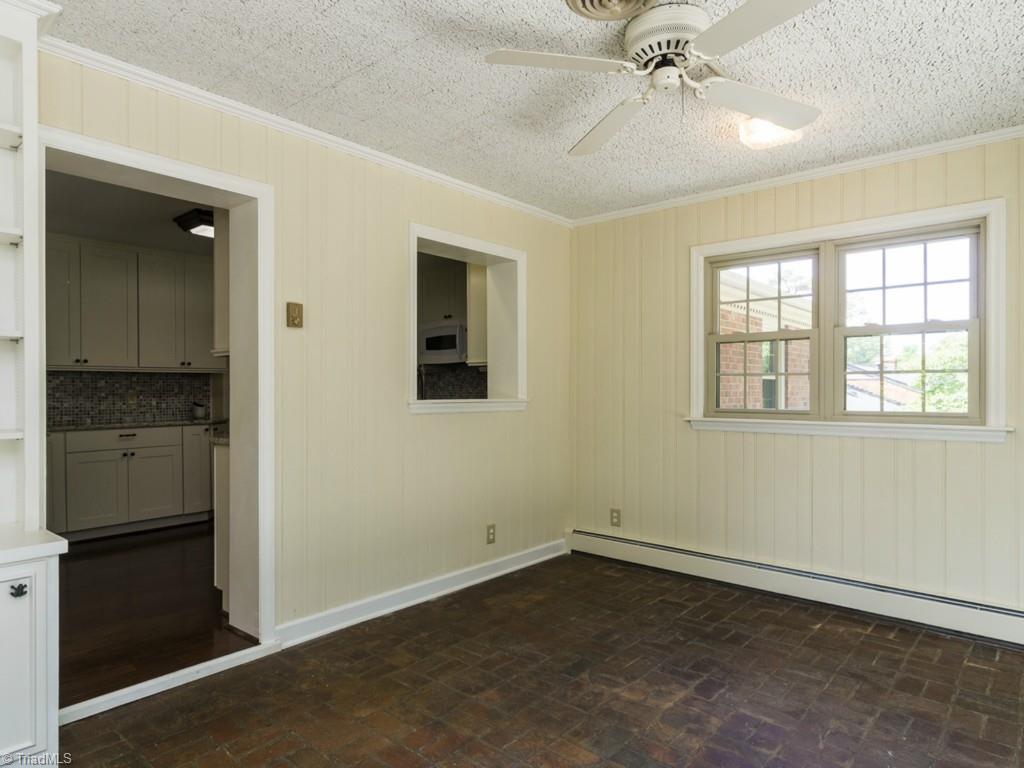 3612 Pinetop Road Greensboro, NC 27410 - Photo 12 of 30 More sunroom to show you the entrance from the kitchen to get a better feel for the layout!
