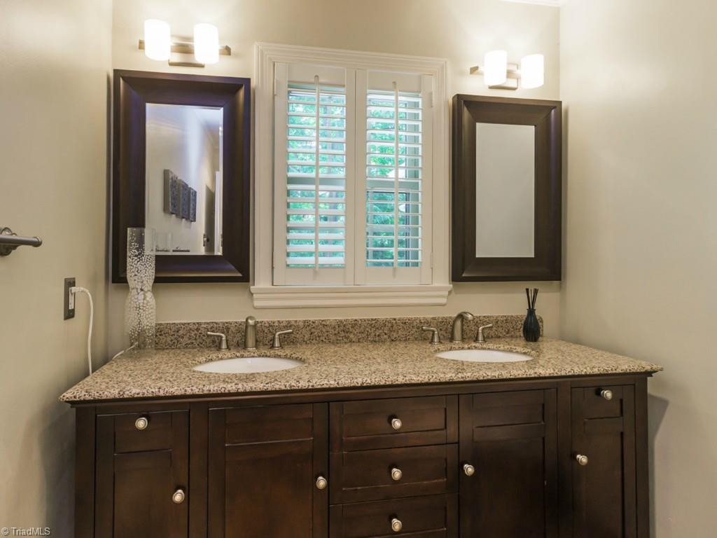 3612 Pinetop Road Greensboro, NC 27410 - Photo 16 of 30 Updated and sleek full bathroom with natural light!
