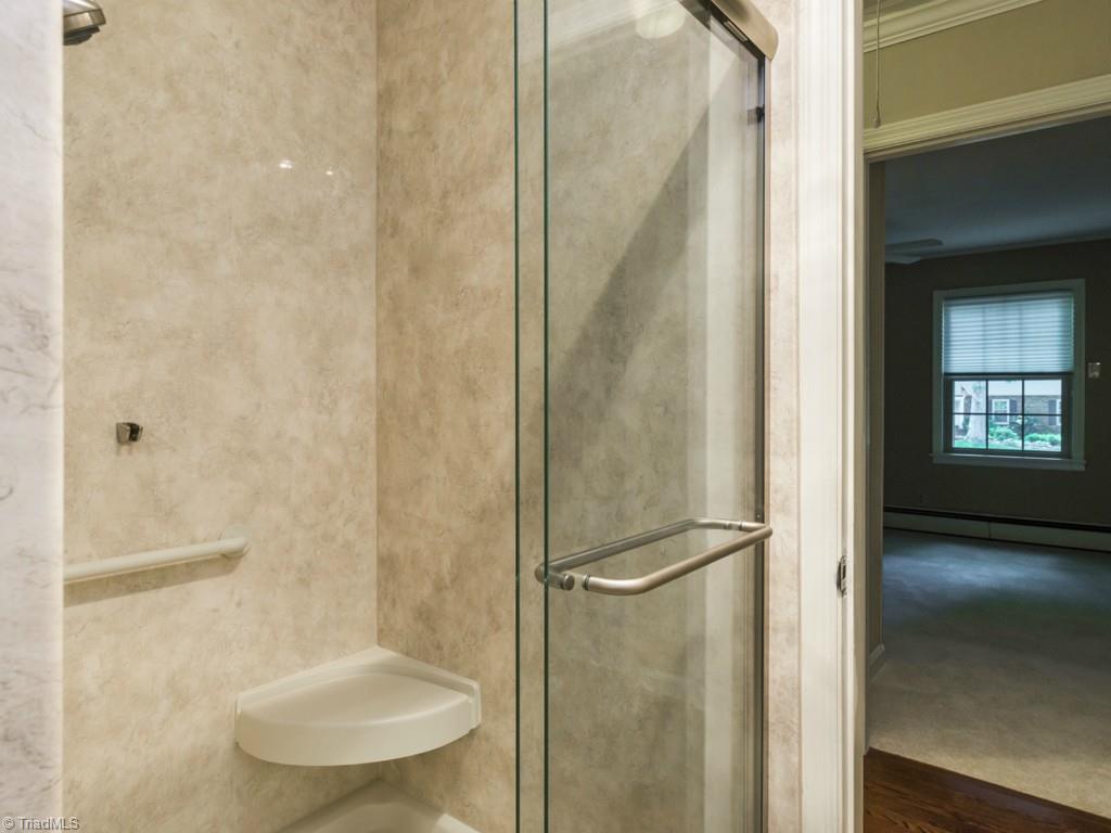 3612 Pinetop Road Greensboro, NC 27410 - Photo 17 of 30 Main level bathroom - this pictures shows off the rest of the updated bath!