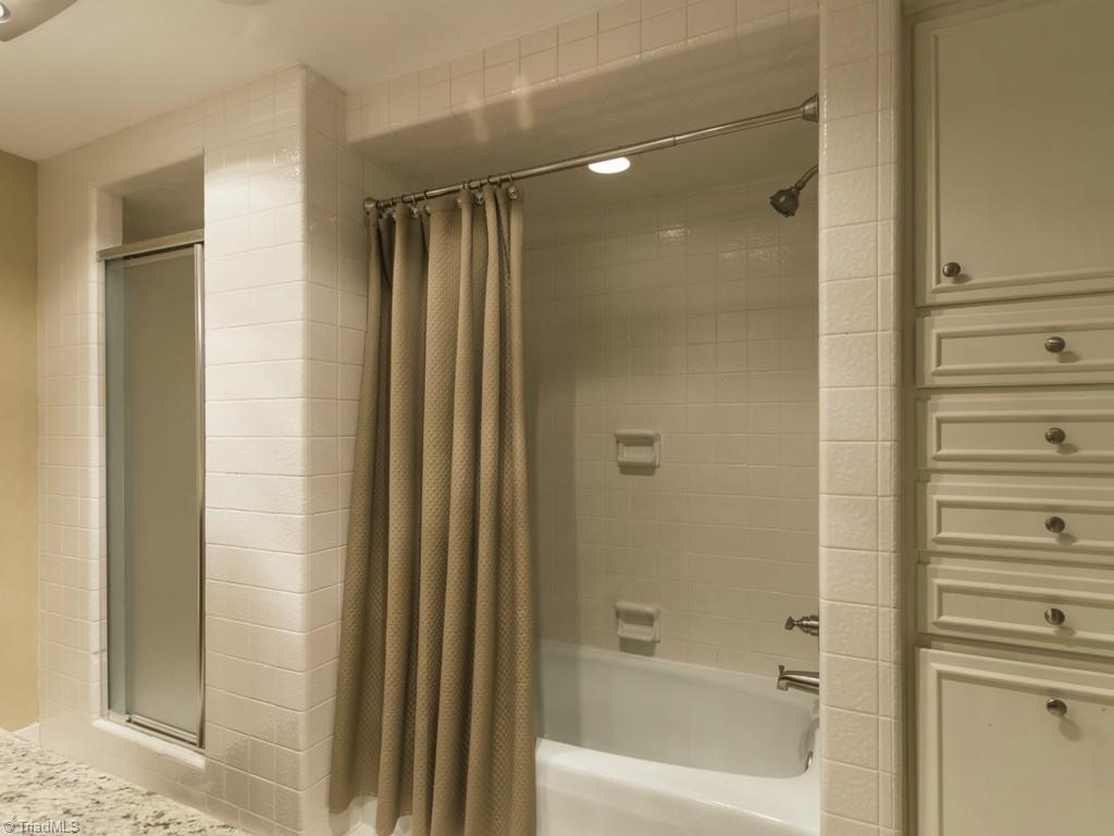 3612 Pinetop Road Greensboro, NC 27410 - Photo 20 of 30 More Master Bath! Look at the storage to the right of the tub!