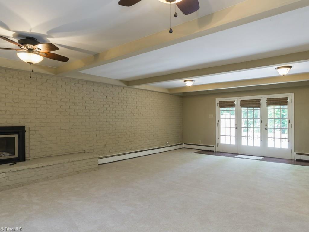 3612 Pinetop Road Greensboro, NC 27410 - Photo 23 of 30 More Den pictures - it has direct access to the stone patio!!