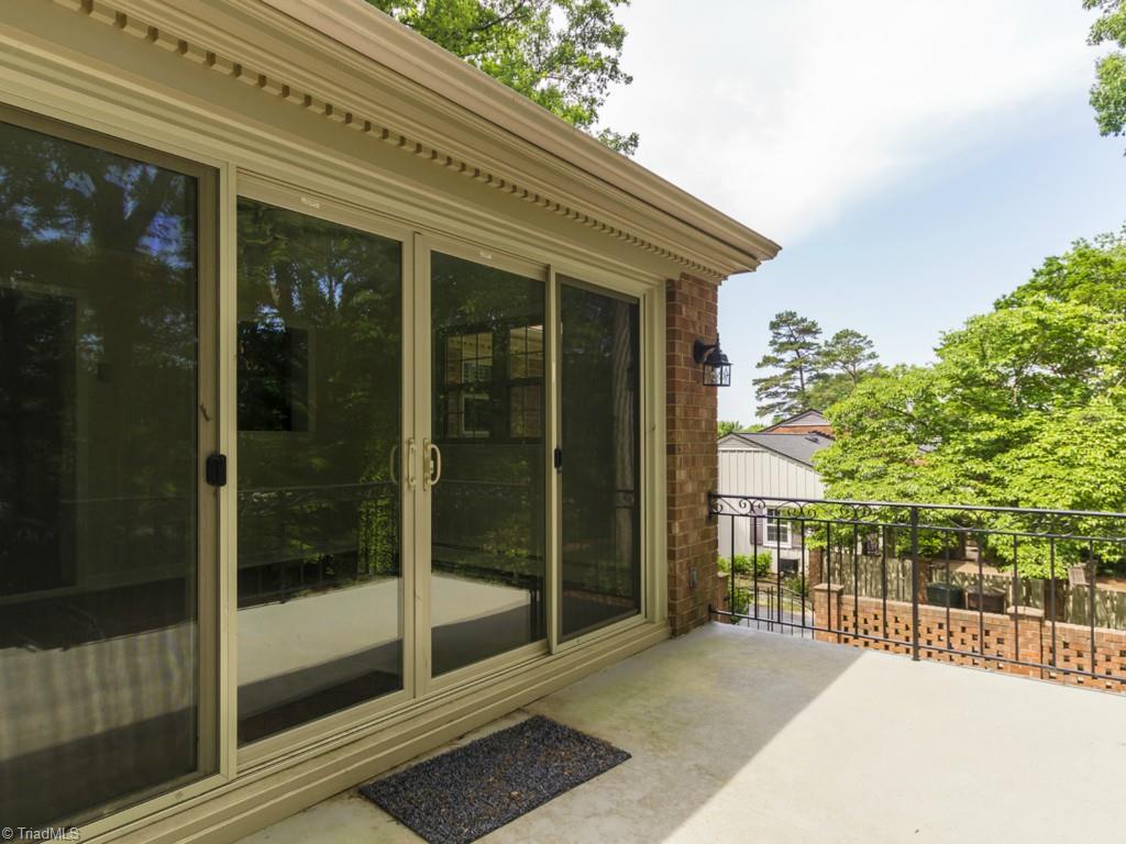 3612 Pinetop Road Greensboro, NC 27410 - Photo 29 of 30 This patio is directly off of your Sunroom.
