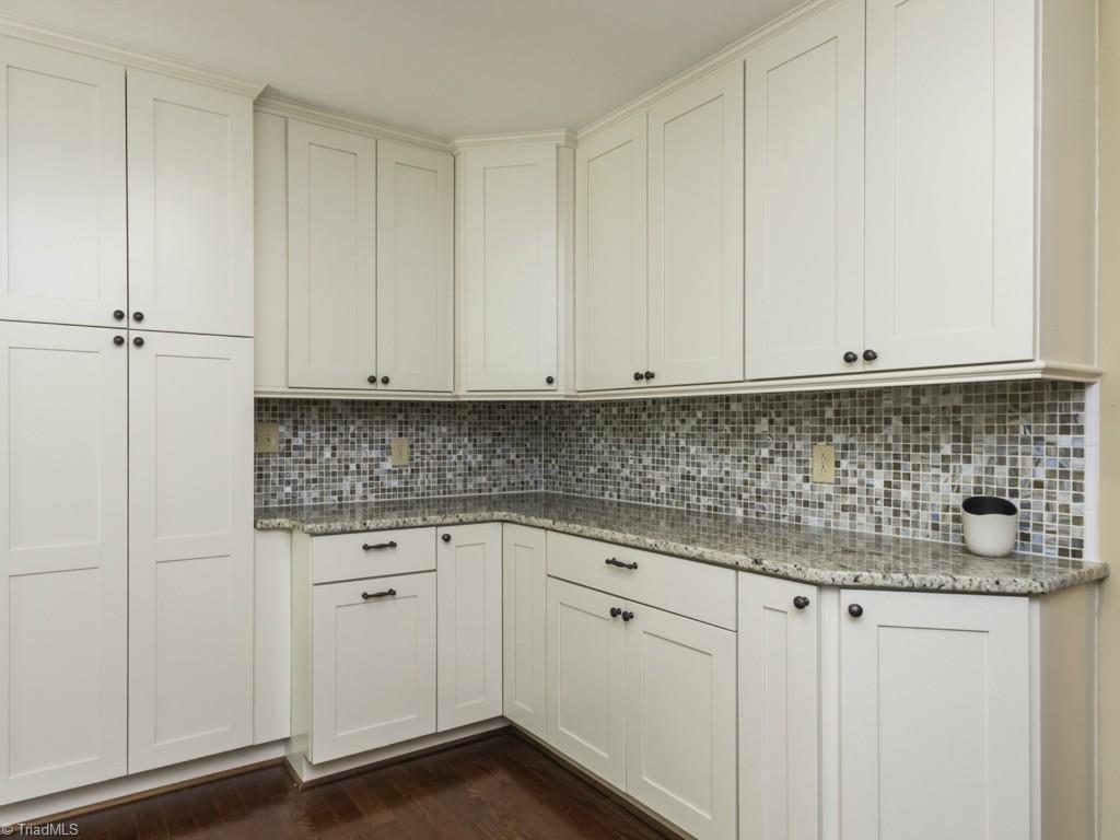 3612 Pinetop Road Greensboro, NC 27410 - Photo 8 of 30 Showing off the storage in this updated kitchen!