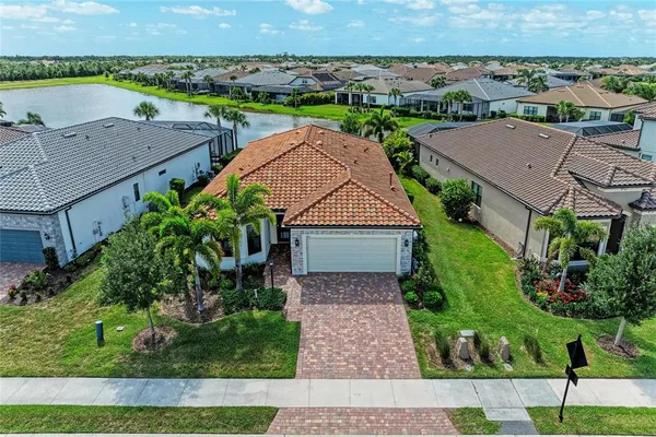 an aerial view of a house with a garden