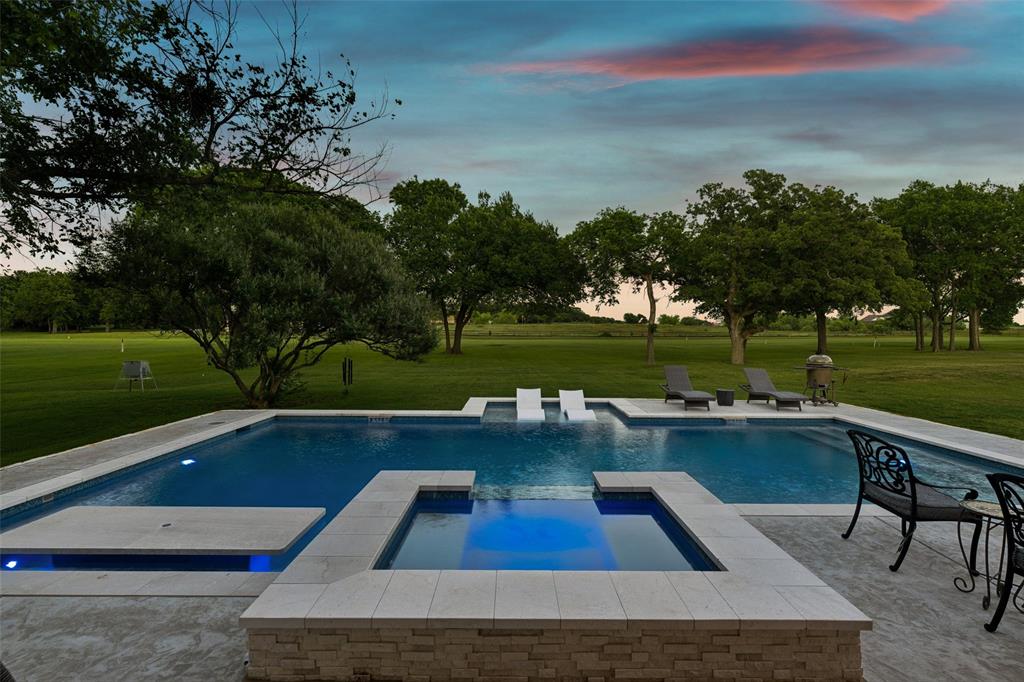 492 County Road 4387 Decatur, TX 76234 - Photo 29 of 40 a view of swimming pool with outdoor seating and lake