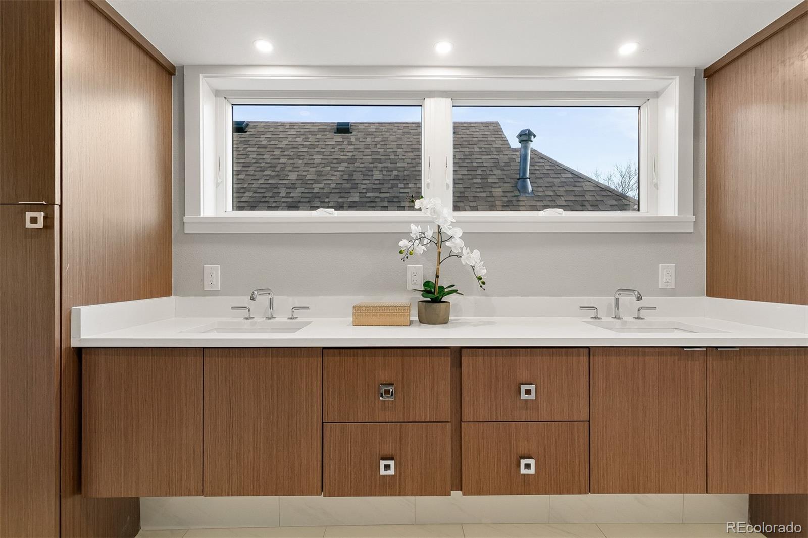 3935 Jason Street Denver, CO 80211 - Photo 16 of 34 a bathroom with a sink and a mirror