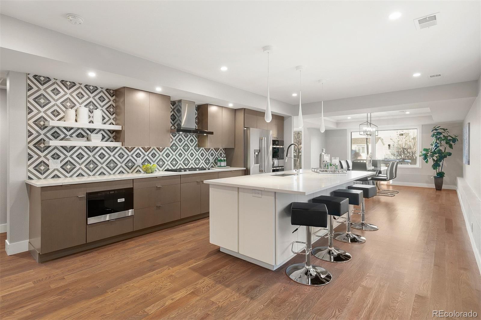 3935 Jason Street Denver, CO 80211 - Photo 2 of 34 a living room with furniture and a wooden floor