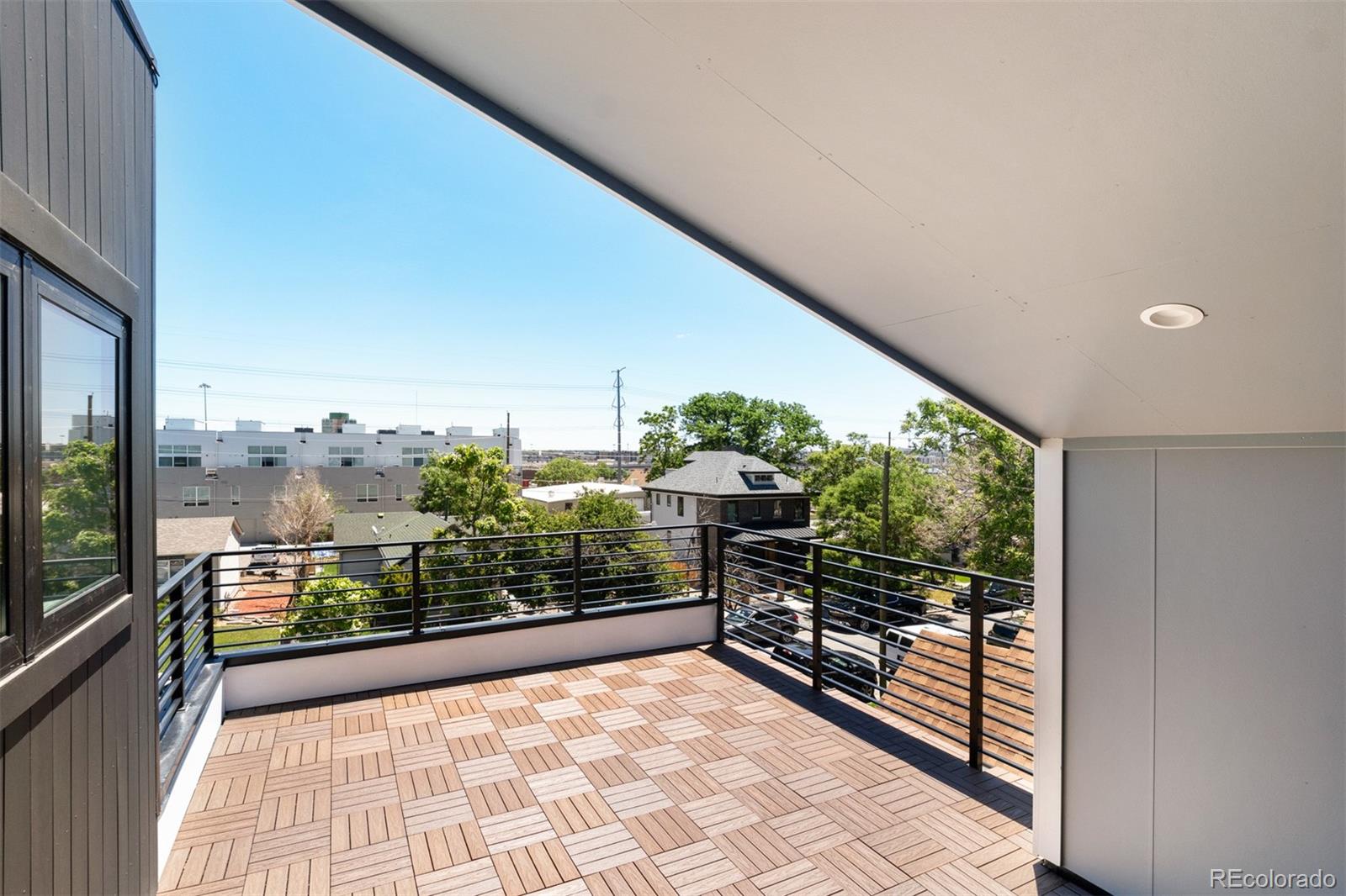 3935 Jason Street Denver, CO 80211 - Photo 28 of 34 a view of a balcony with chairs
